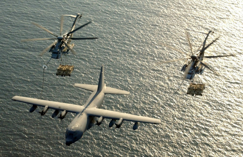 CH-53Es tanking up from C-130
